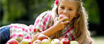 Girl eating an apple