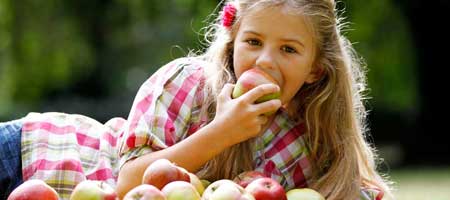 Girl eating an apple