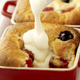 Peach and berry pie with cream