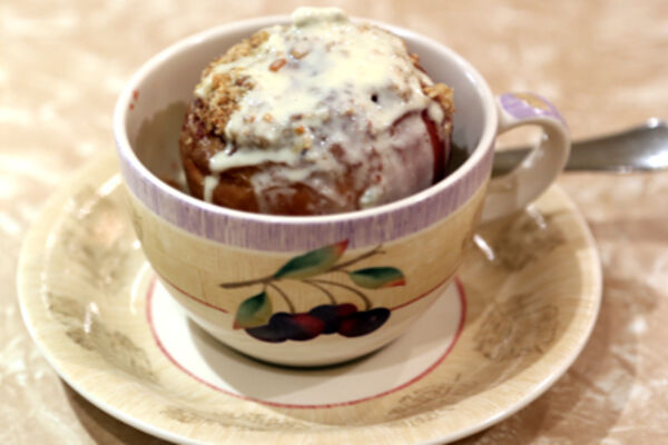 Bakes apples filled with damson jam & topped with crumble