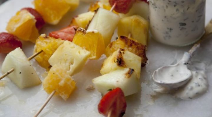Spiced fruit skewers with honey and yogurt dip