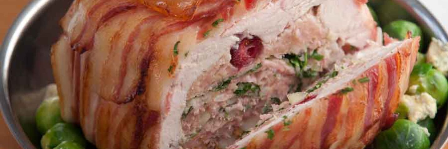 Streaky bacon and turkey bombe with stuffing